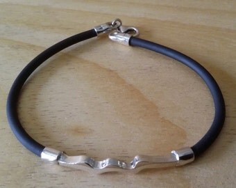 Braccialetto in argento 925, italiano, e caucciù.