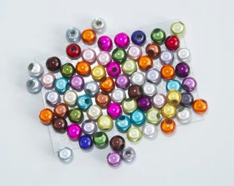 Lot de 50 perles magiques 4mm - multicolore