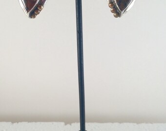 Sterling silver rain drop stud earrings with brass accents and petersite stone.