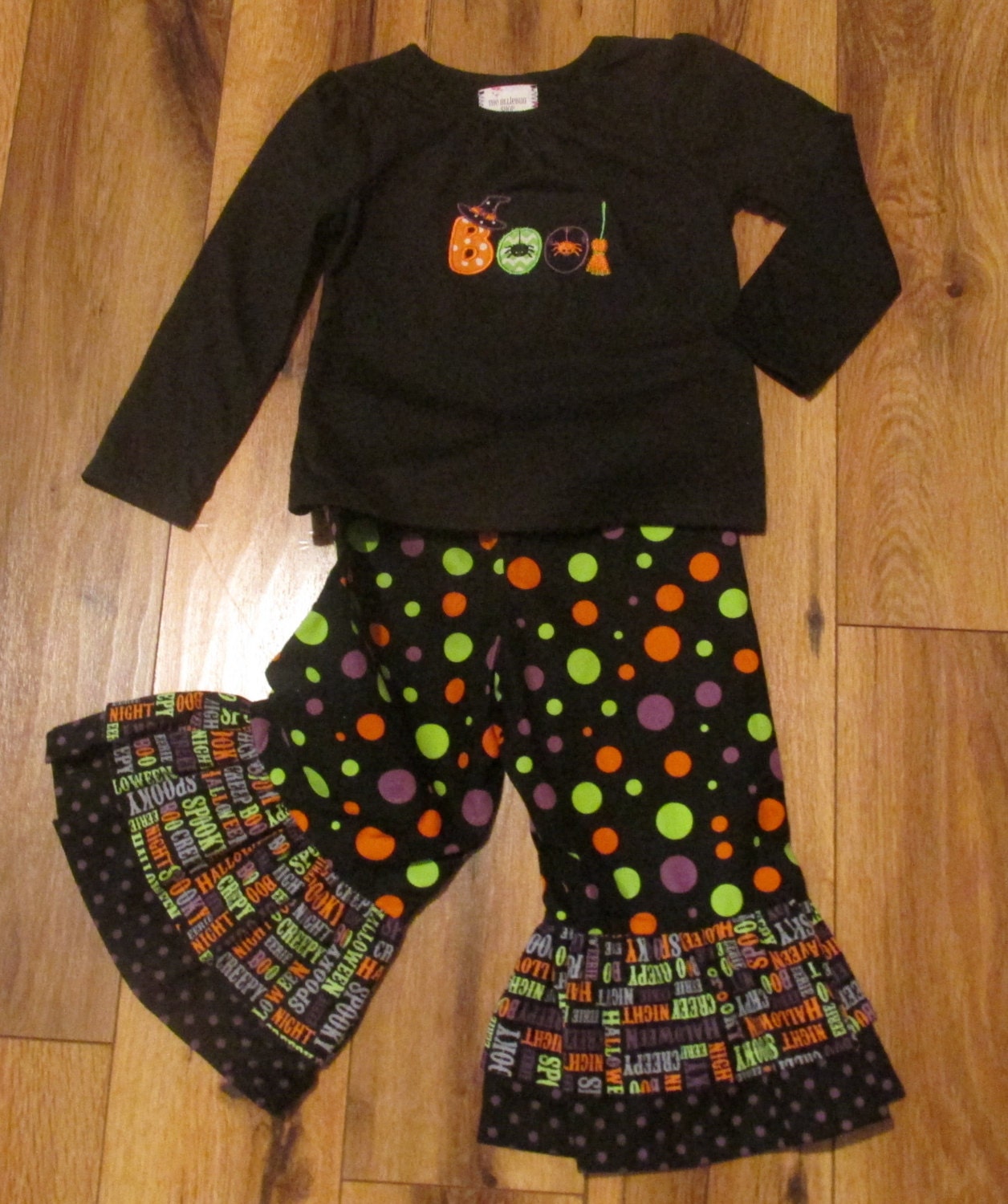 Halloween outfit with ruffled pants.