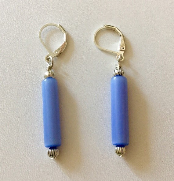 Light blue dangle earrings with a lever back clasp.