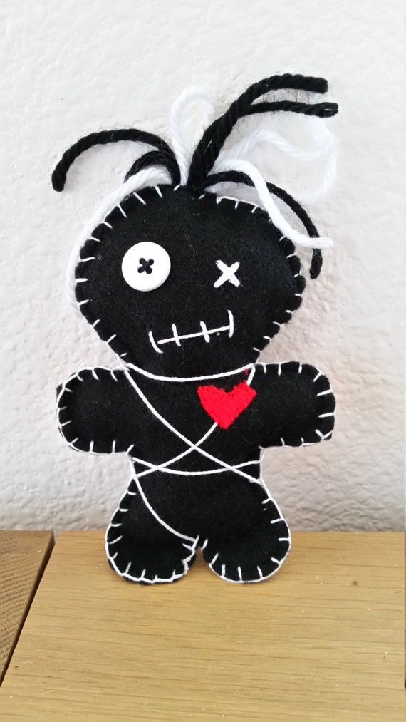 black and white voodoo doll