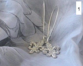 Silver earrings with fleur de lis, sol key or starfish pendant