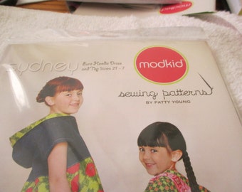 modkid sewing pattern for a Sydney top and dress (no pants) in sizes 2T-7 by Patty Young