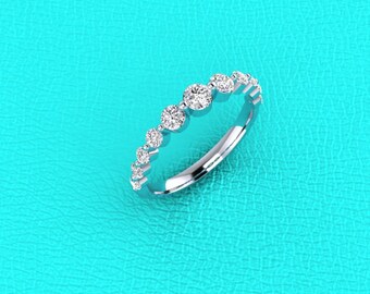 14K white gold graduated single prong Diamond band