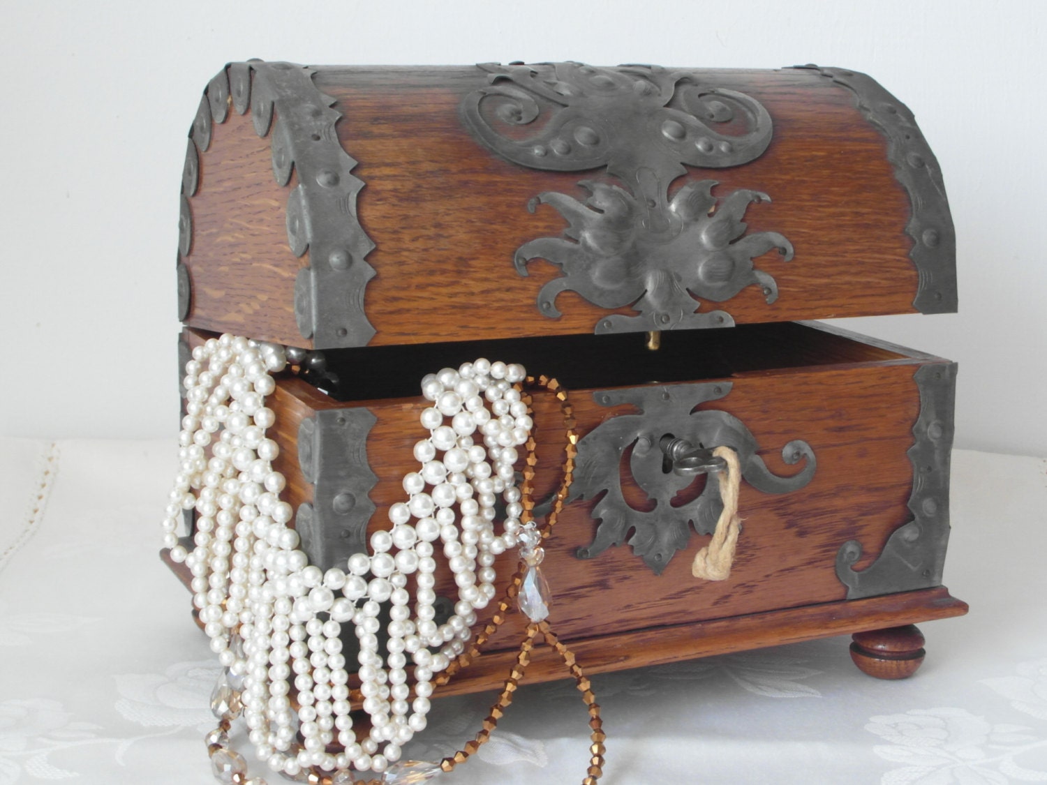Antique treasure chest of wood with wrought iron, handicrafts jewelry