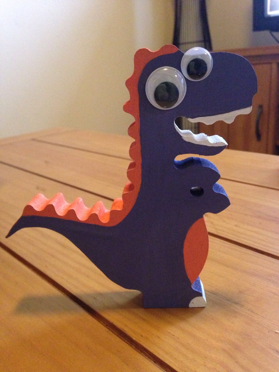 Handpainted wooden dinosaur by AuntieNickNocks on Etsy