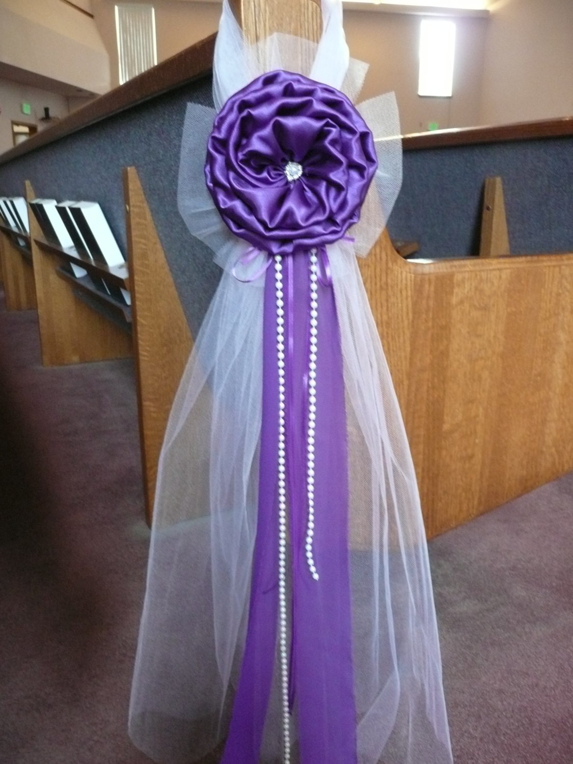 Purple Pew Bows Church Aisle Decorations. David's Bridal