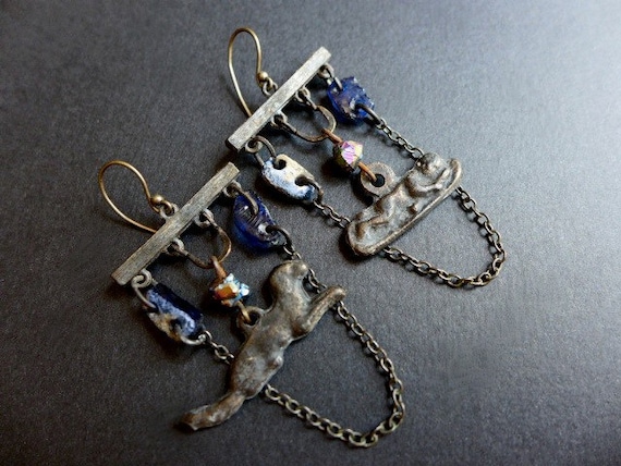 Mercy from Above. Rustic oxidized dark earrings with milagros and Roman glass.
