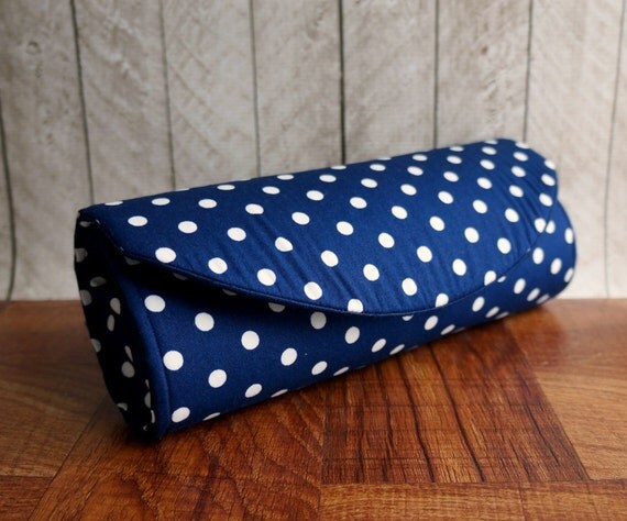 navy and white polka dot clutch bag