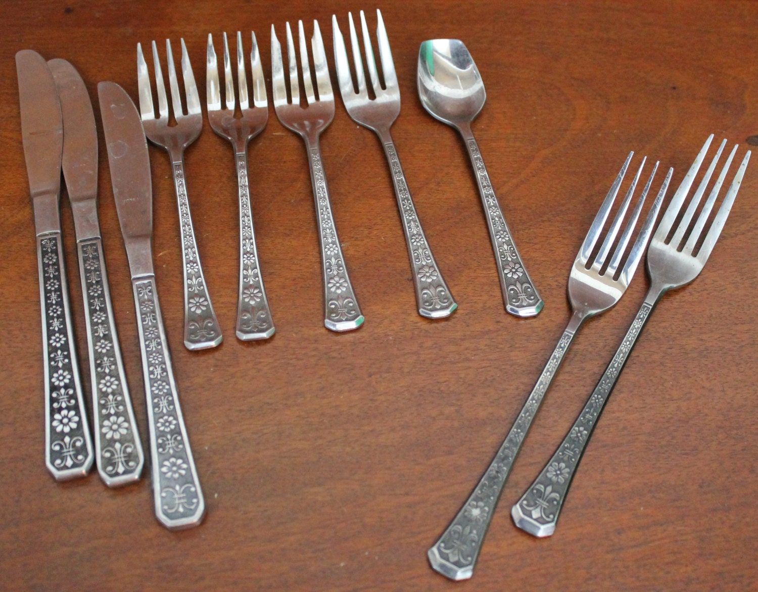 Florenz Stainless Flatware by Interpur Fleurdelis and