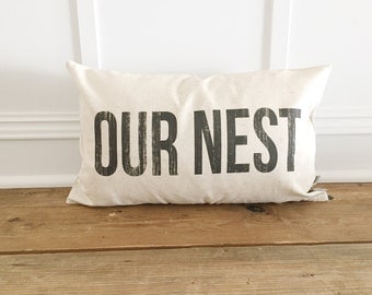 Distressed Our Nest Pillow Cover
