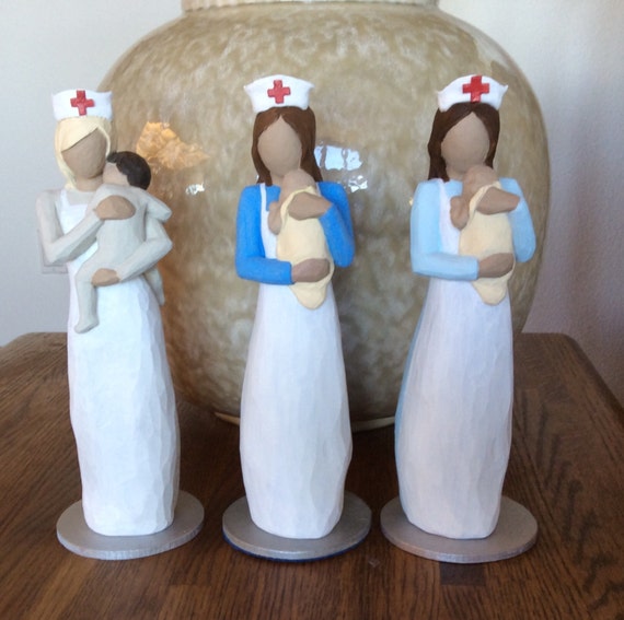 Pediatric Nurse RN Gift Figurine Holding a by MusicLadyGifts