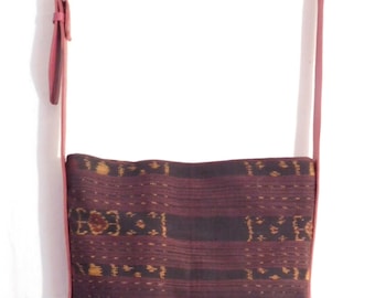 Handwoven ikat fabric and red leather cross body messenger bag