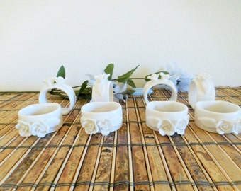 Eight Floral White Ceramic Napkin Holders