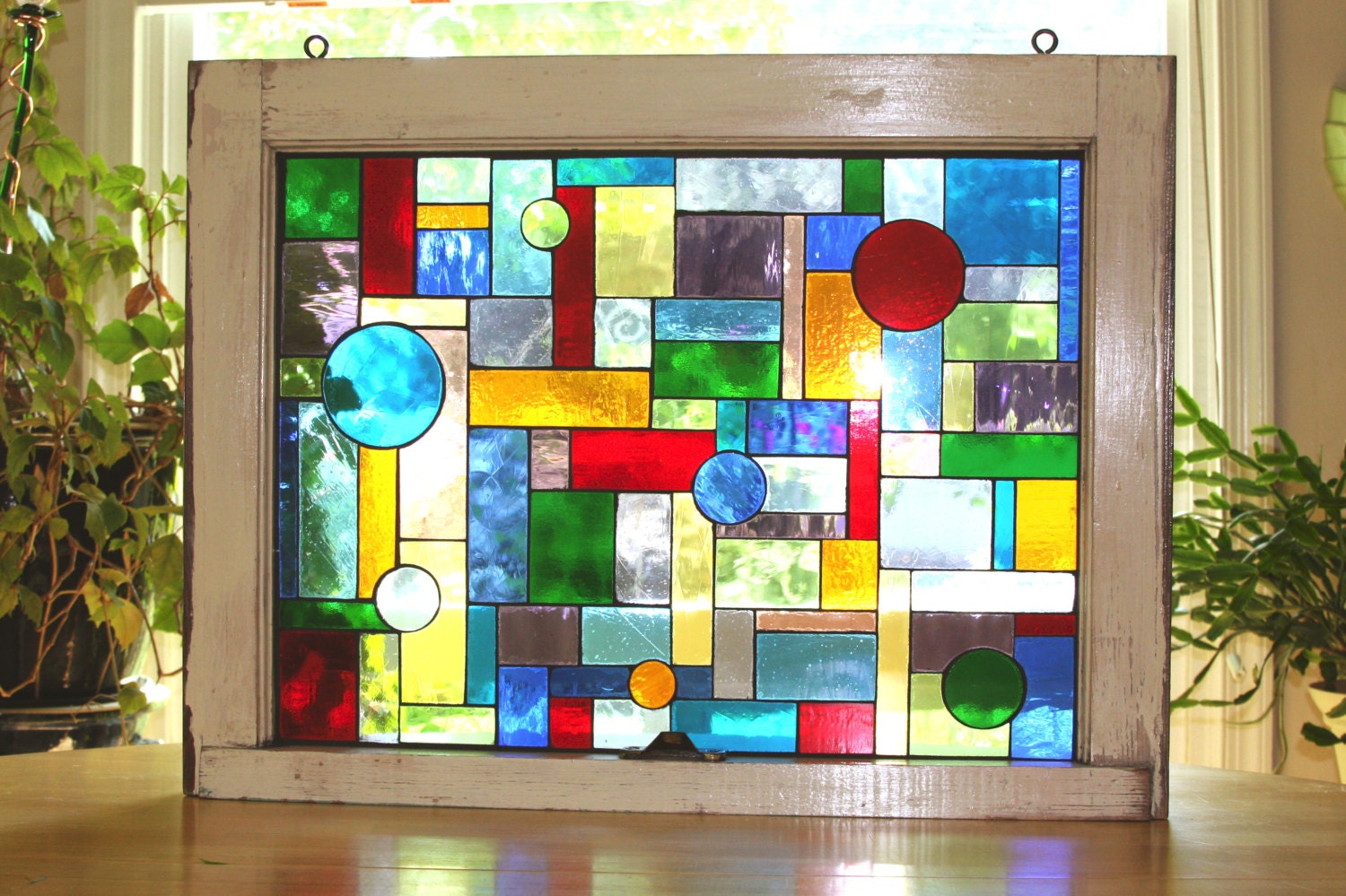 Glass on glass mosaic in vintage window