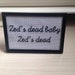 Zed's dead baby Zed's dead Pulp Fiction Framed Cross by EBCraftsUK