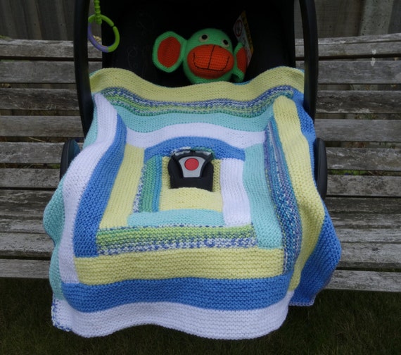 Items similar to Hand knitted car seat blanket, baby ...
