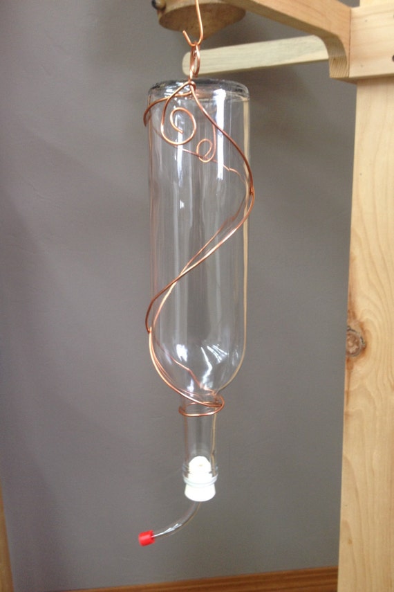 Wine bottle hummingbird feeder by PioneerRoadPottery on Etsy