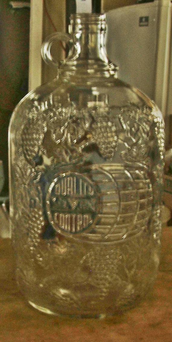 Vintage Heavily Embossed Grape Vine Barell Gallon by EFMANTIQUES