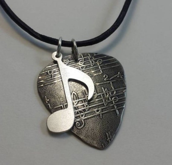 Sterling Silver Guitar Pick necklace with music note charm by