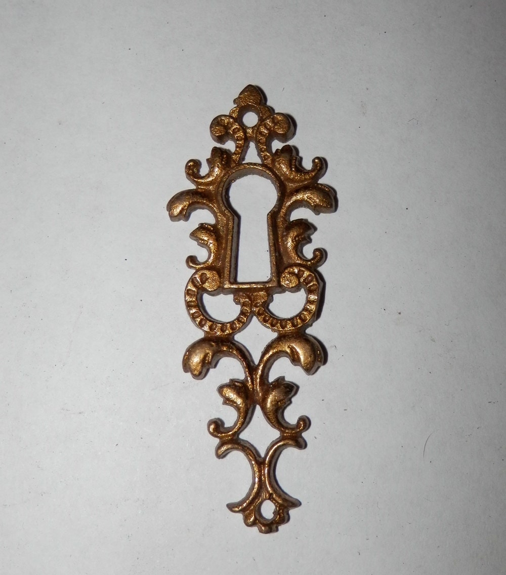 antique cast brass keyhole cover escutcheon