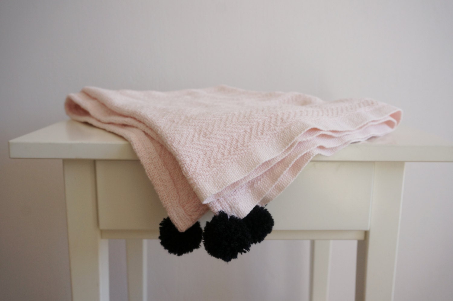 Knitted cotton baby blanket with pom poms girl pram