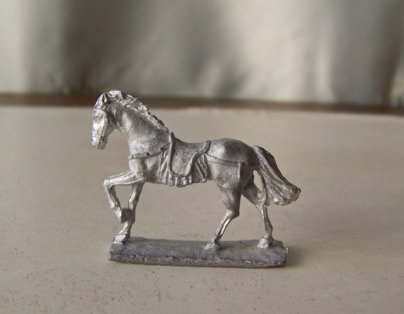 old metal horse figurines