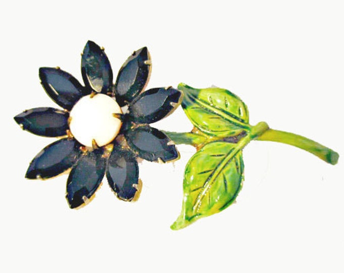 Flower Brooch with black and white glass and green enamel pin