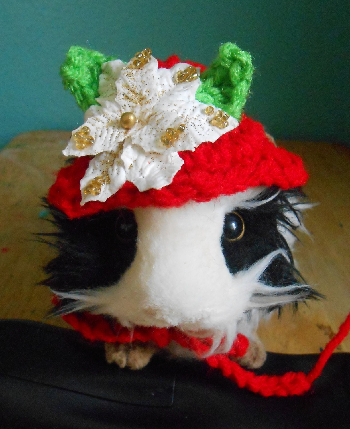 Crocheted Guinea pig Christmas Hat White Poinsettia Flower