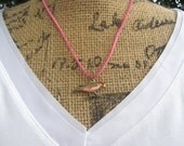 Retro Vintage Style Bird Or Butterfly Pendant Necklace on Pink Suede