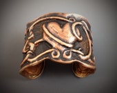 Vined heart chasing and repousse cuff Vined heart chasing and repousse cuff