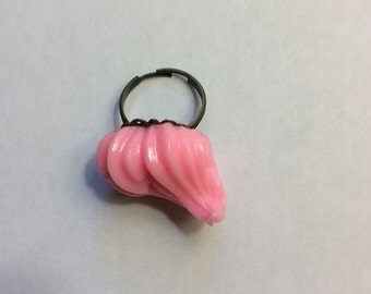 Pink whipped cream ring.
