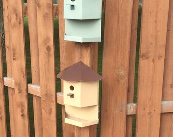 Decrative metal bird house and attached tray
