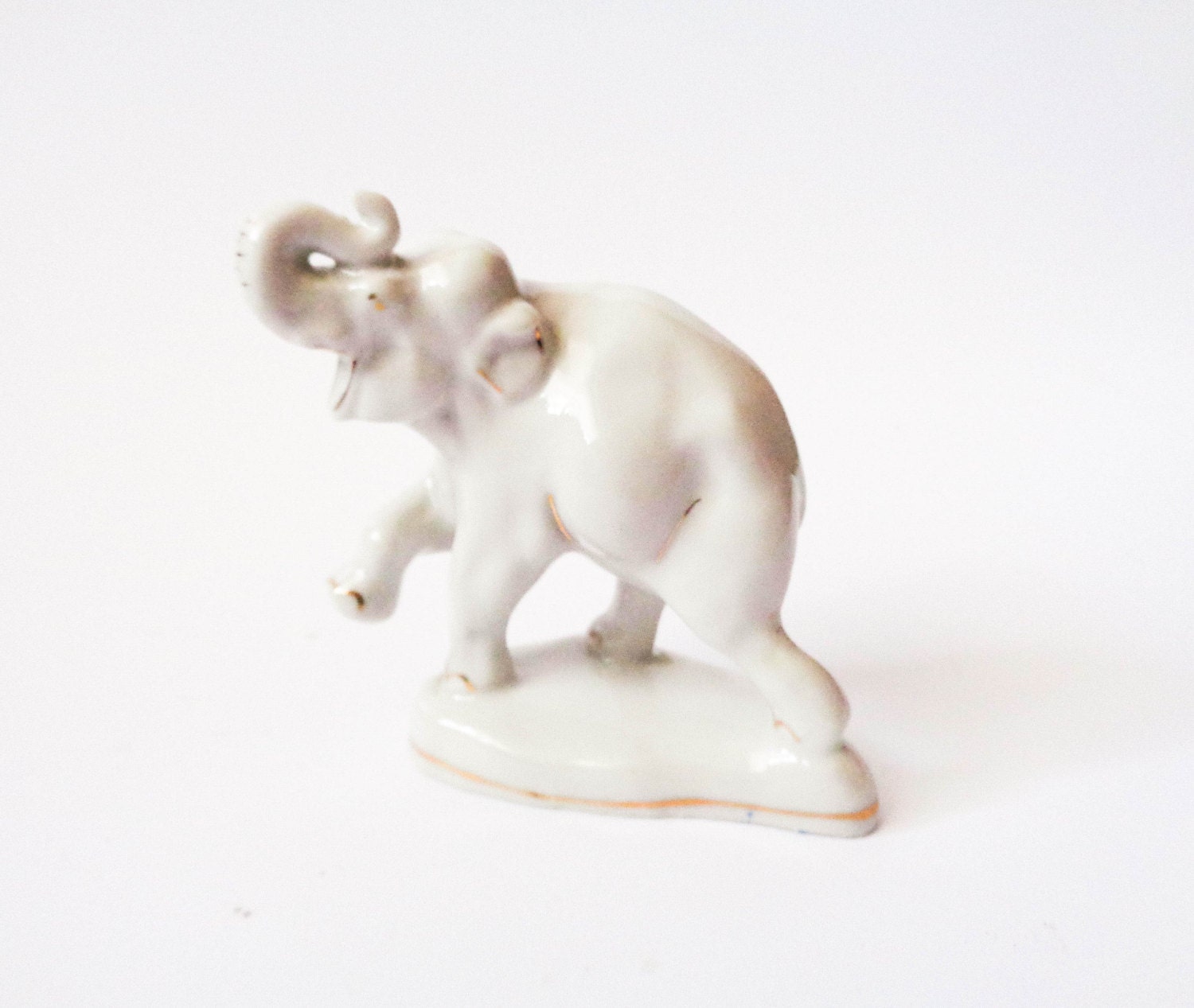 white porcelain elephant figurine