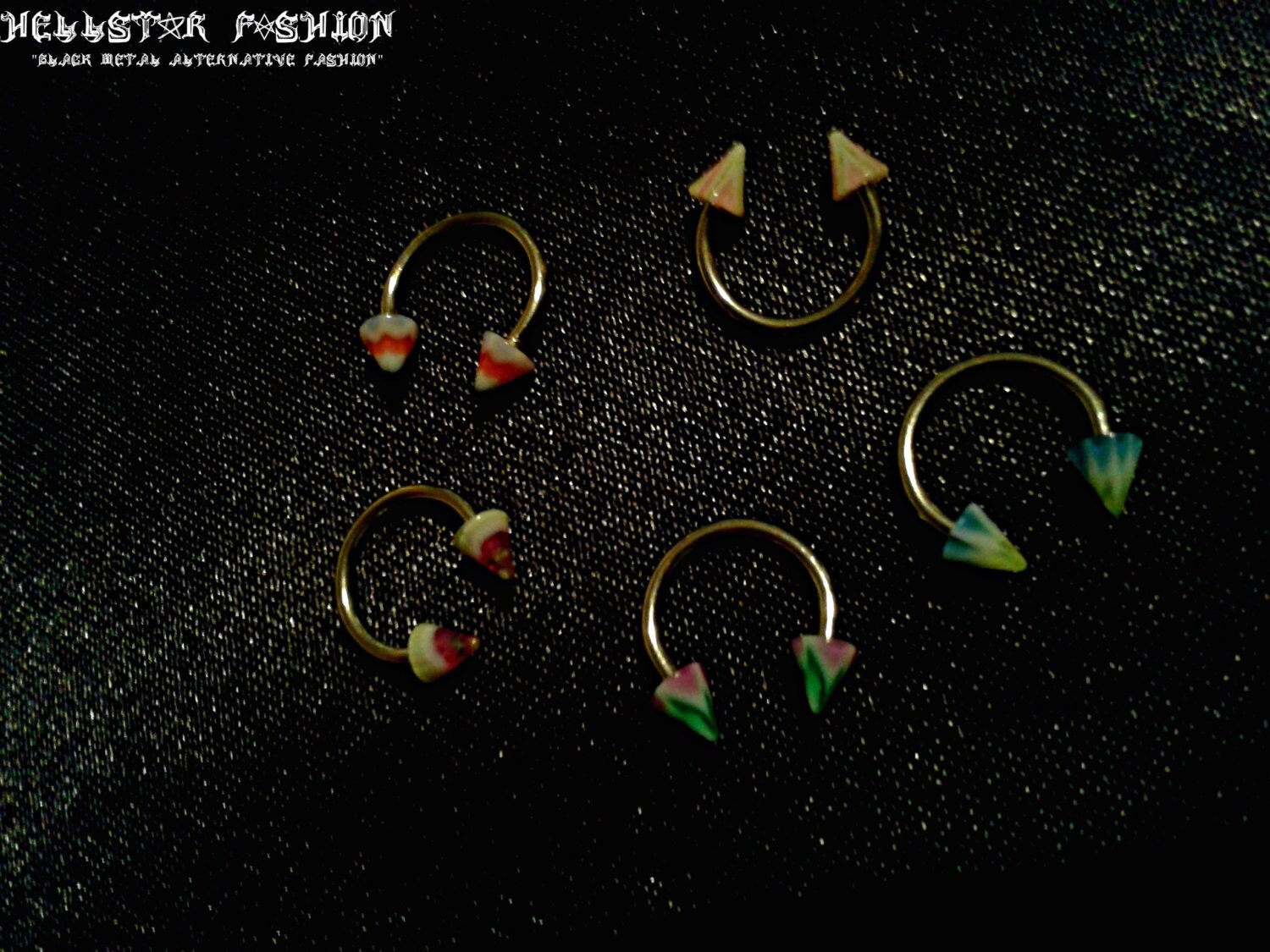 devil colored horn horseshoe ring earring nose eyebrow