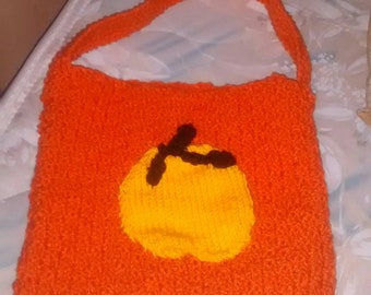 Orange pumpkin bag for candy supply