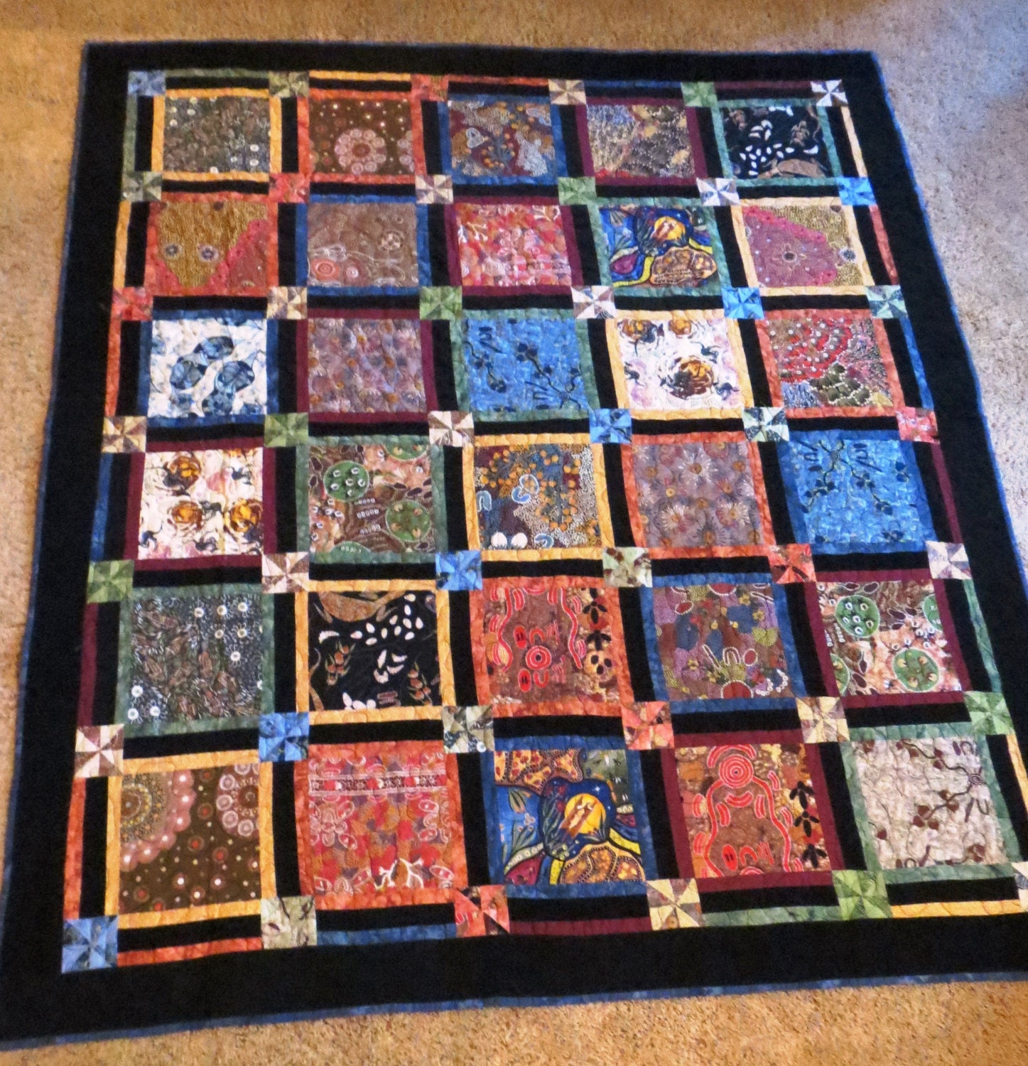 Australian Fabric Quilt with Black Corduroy Borders
