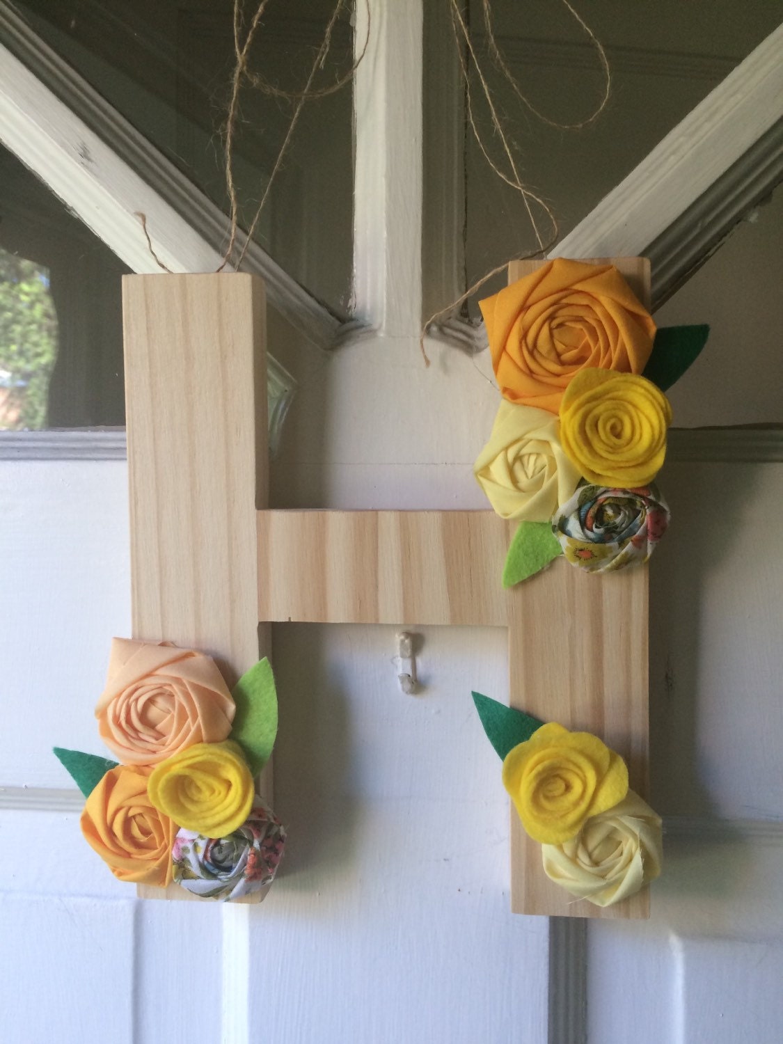 Letter door hanger with fabric and felt by bellerosedesigns