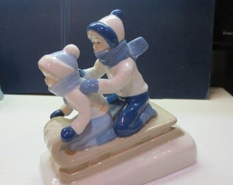 Vintage Porcelain Sled Figurine Mexican Porcelain Paul Sebastian Cuernavaca