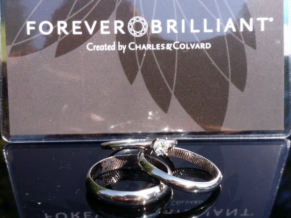 Fingerprint wedding set. Complete 3 piece set all 14k white gold. Included mens band, engagement, and wedding rings.