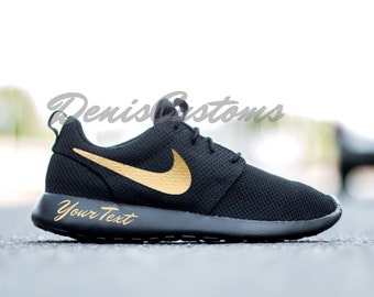 nike roshe one black and gold