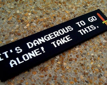 It's dangerous to go alone! Take this. - Legend of Zelda - Wooden Sign