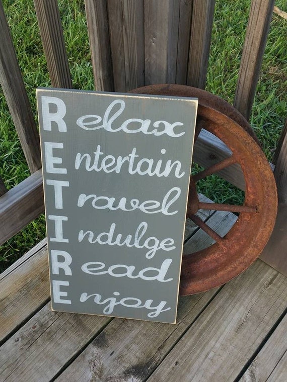 Retire sign RETIRE Relax Entertain Travel Indulge Read