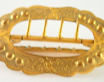 Vintage GILT BELT BUCKLE, Oval shape - Scroll Motif - embossed dots- 4 haps- back plain side attached - natural age patina- Art Nouveau