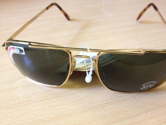 Foster Grant vintage sunglasses gold aviator geometric shape