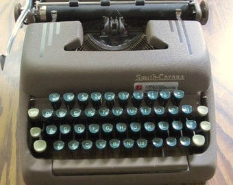 A Cool Vintage 50's era,Brown Mid Cenutry SMITH-CORONA Typewriter With Green Keys.