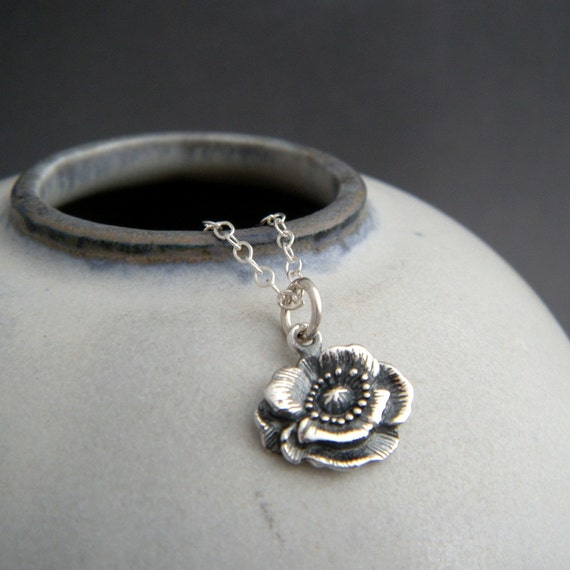 tiny silver poppy flower necklace. small nature pendant.