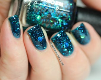 Nail polish - "Oceanic Forces" holographic dot glitter in a dark teal base