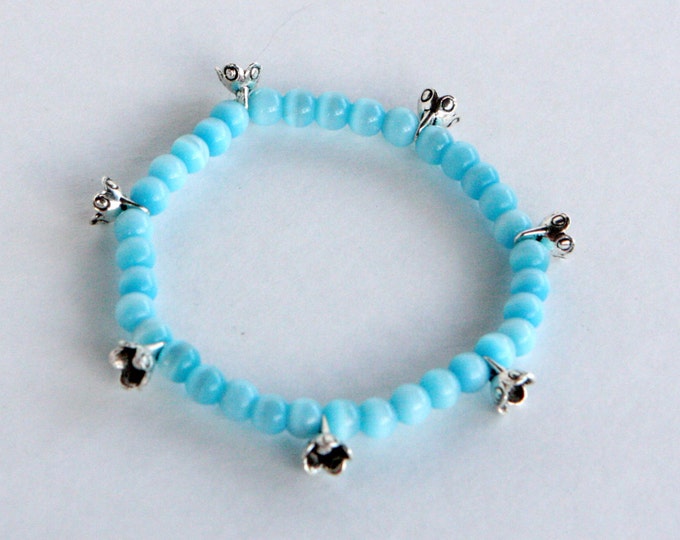 Zen flower charm stretch bracelet with Tigre eye beads
